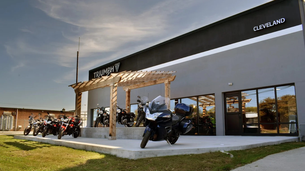 The Triumph Cleveland dealership from the street, with motorcycles on the front pad
