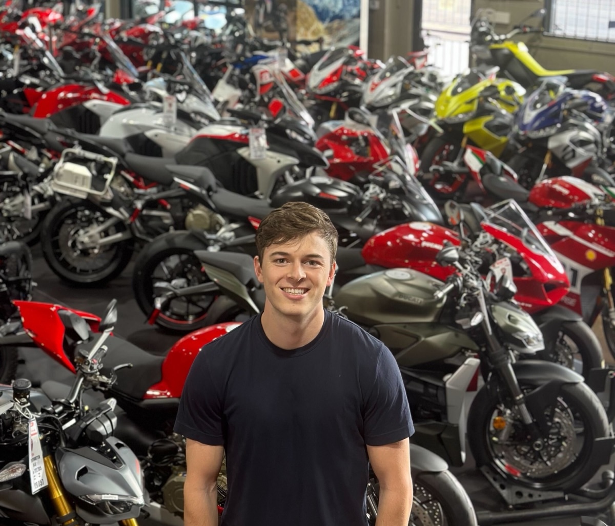 Chris on the showroom floor at a dealership in SoCal